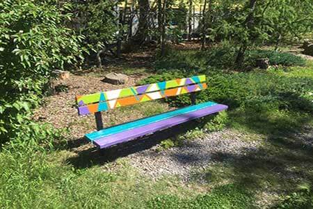 Sunalta-bench-in-community-garden-new-res